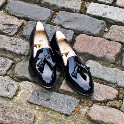 contemporary patent dress pumps with tassels