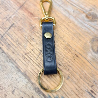 a leather key fob with the oxo tower logo stamped into it
