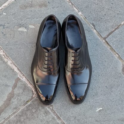 pair of black bespoke oxford shoes
