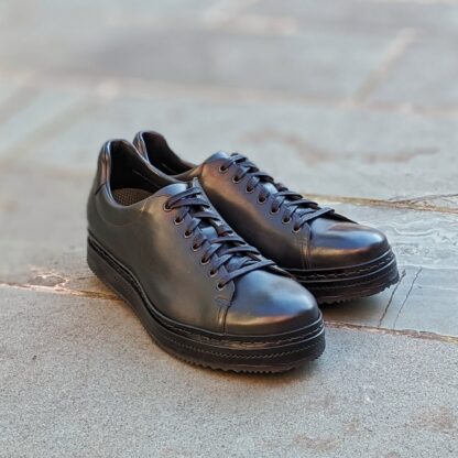 black bespoke trainers made by hand