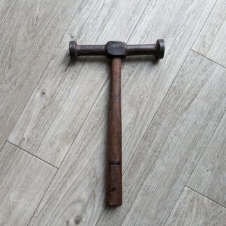vintage hammer for nailing with wooden handle
